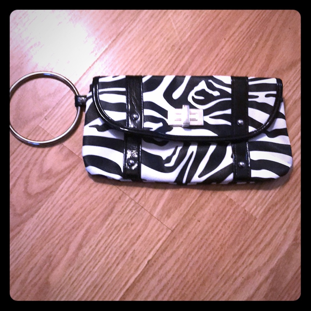 Charming Charlie’s zebra print clutch